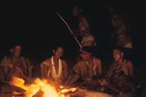 Sitting around the fire in the Kalahari Desert